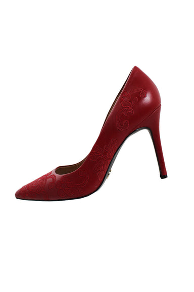 michael kors dark red high heel pumps. features embroidered floral details and a pointed toe area. please see condition. sold as is.