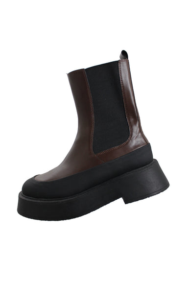 mng brown faux leather lug sole mid high chelsea boot. features elasticized gussets, pull tab, thick rubber sole, and rubber around toe extends around boots. 