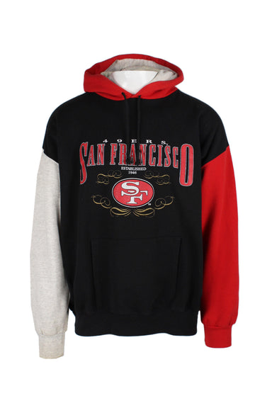 vintage nutmeg black/red/grey pullover hoodie. features ‘san francisco 49ers’ graphic printed at chest, logo tag at front left above hem, front kangaroo pouch pocket, drawstrings at hood, contrast color hood/sleeves, with ribbed cuffs/hem
