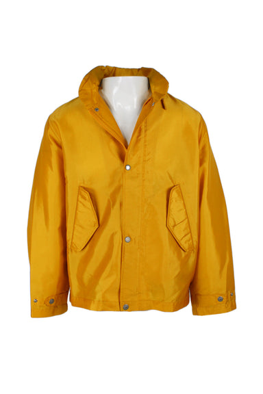  vintage banana republic yellow nylon rain jacket. features zip detail at collar, dramatic flap pockets at waist, barrel cuffs, branded silver-toned snap button closure along front, boxy fit.