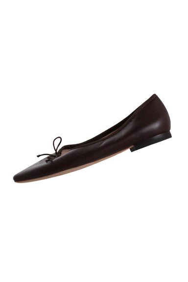  loeffler randall brown ballet pumps featuring a pointed toe, bow tie on upper, ribbed trim and a .5" heel.