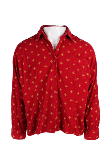 woolrich red long sleeve corduroy shirt. features gold star pattern throughout with pocket at left breast.