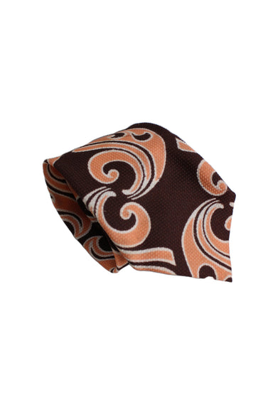 vintage tergal brown and peach tie. features a conceptual large paisley design. please see condition. sold as is.