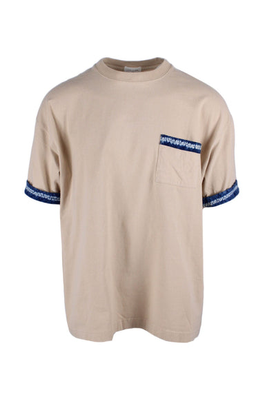 life is now beige short sleeved top featuring a round ribbed neckline, tonal topstitching, blue and white tie dies trim, a chest pocket and a standard fit. 