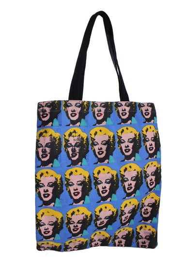 andy warhol foundation blue cotton print tote bag. features marilyn monroe pop art print at front, white 'in the future everybody will be world famous for fifteen minutes.' text print at back, black tone straps, and contrast stitching.
