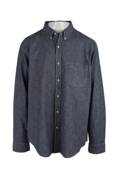 j.crew blue long sleeve chambray shirt. features button-down collar, chest patch pocket, pearlized button closure, and slim fit. *please note: the actual color of this item is lighter than as depicted in photos*