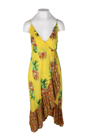  farm rio yellow cotton midi wrap dress. features floral/pineapple print throughout, v neckline, spaghetti straps, asymmetrical ruffled hem, and self-tie fastening at waist.