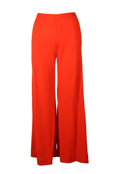 ursula of switzerland orange pants. features flare style, and zip closure at left side.