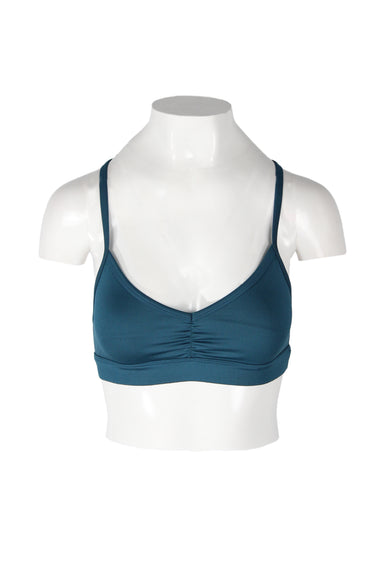 alo pacific blue sports bra. features v-neckline, ruched center front, decorative back straps, contrast branding at back, and elastic band at lower bust. lined. 