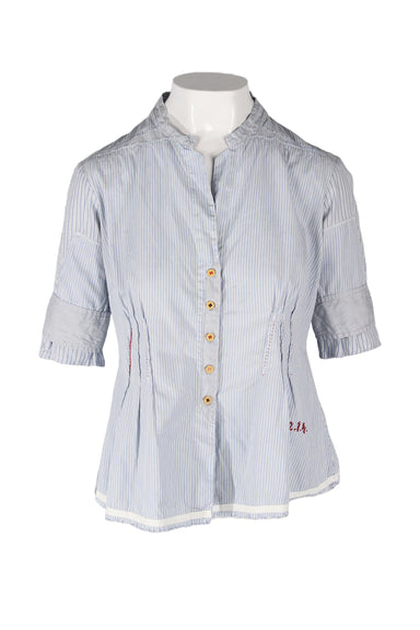  le jean de marithe francois girbaud blue & white striped blouse. features striped shell, red branded topstitching at pleated flounce waist, key-hole neckline, three-quarter-length sleeves, raw trim, bias cut fit, yellow button closure along front.