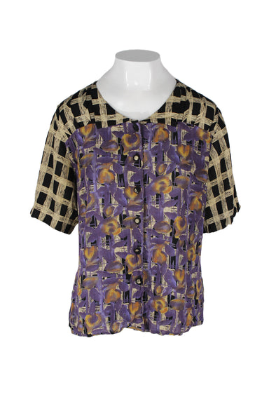 vintage marsha brander for coponix black/beige/purple rayon blouse. features abstract purple/orange flower design on front over plaid all over pattern, small pointed collar, and fabric covered buttons down center front.  