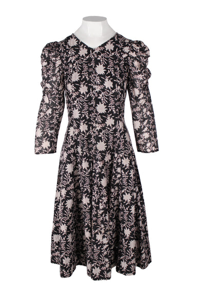description: ulla johnson black and pink floral print dress. features of-mutton sleeve three-quarter sleeve, fitted bodice, voluminous skirt, and zipper closure at center back.
