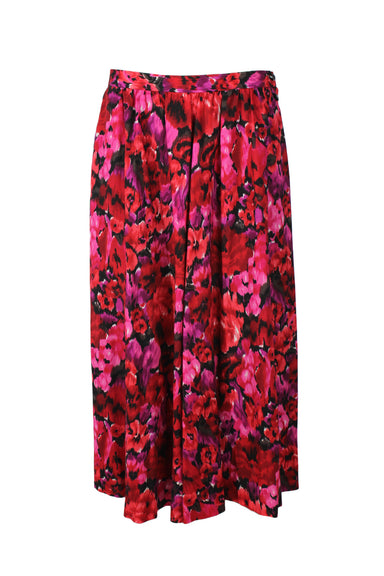 vintage jaeger pink/red wool midi skirt. features abstract floral print throughout, slightly pleated, slash pockets, and double button closure at left side.
